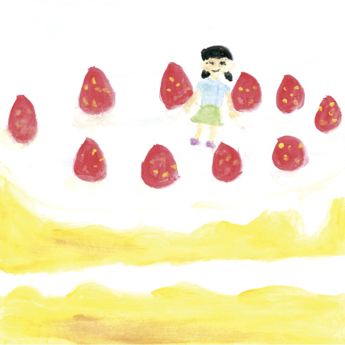 大きなショートケーキと立っている私